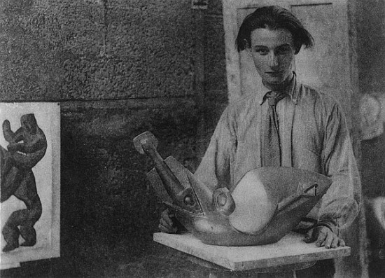 Henri Gaudier-Brzeska with his sculpture ''Bird Swallowing Fish'' in Kettle''s Yard, University of C a English Photographer