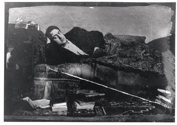 Portrait of Guillaume Apollinaire (1880-1918) reclining, c.1910 (b/w photo)  a French Photographer