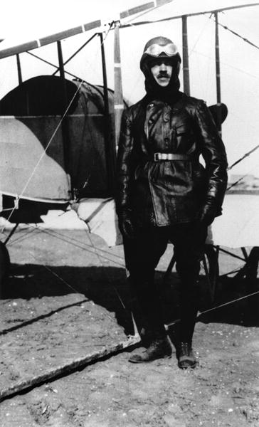 Roland Garros (1888-1918) standing beside his plane, 1915 (b/w photo)  a French Photographer