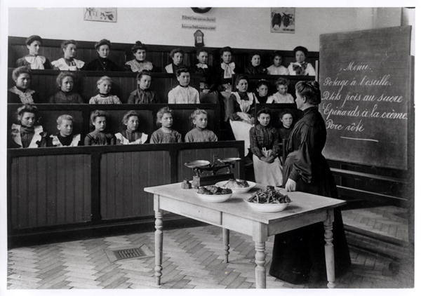Young girls in a cookery lesson (b/w photo)  a French Photographer