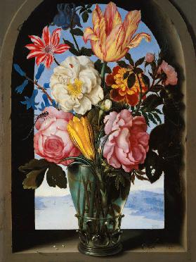Still life of flowers in a drinking glass