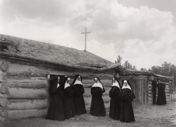 Nuns in front of the Saint Labre mission, Ashland, Montana (b/w photo)  a American Photographer