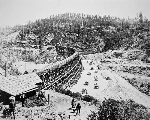 Chinese labourers working on a trestle bridge on the western slope of the Sierra Nevada mountains, 1 a American Photographer, (19th century)