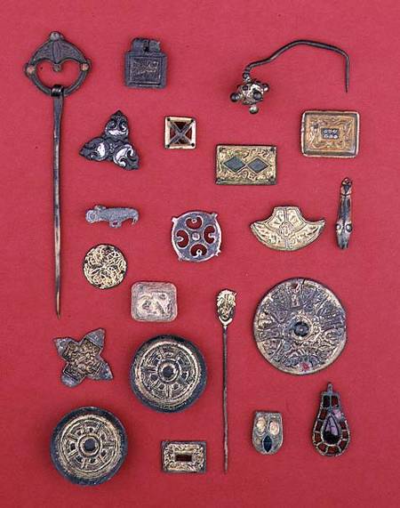 Collection of Anglo-Saxon and Celtic jewellery including gilt bronze mountssaucer and cruciform broo a Anonimo