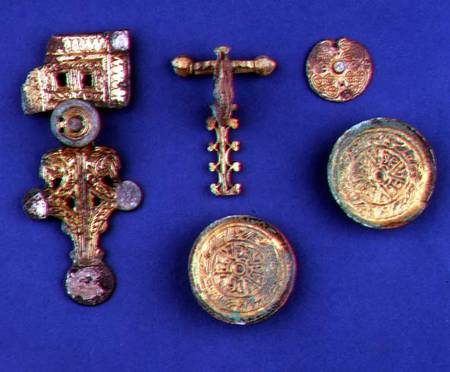 Selection of Anglo-Saxon jewellery; gilded bronze brooch; gilded bronze crossbow fibula; gilded copp a Anonimo