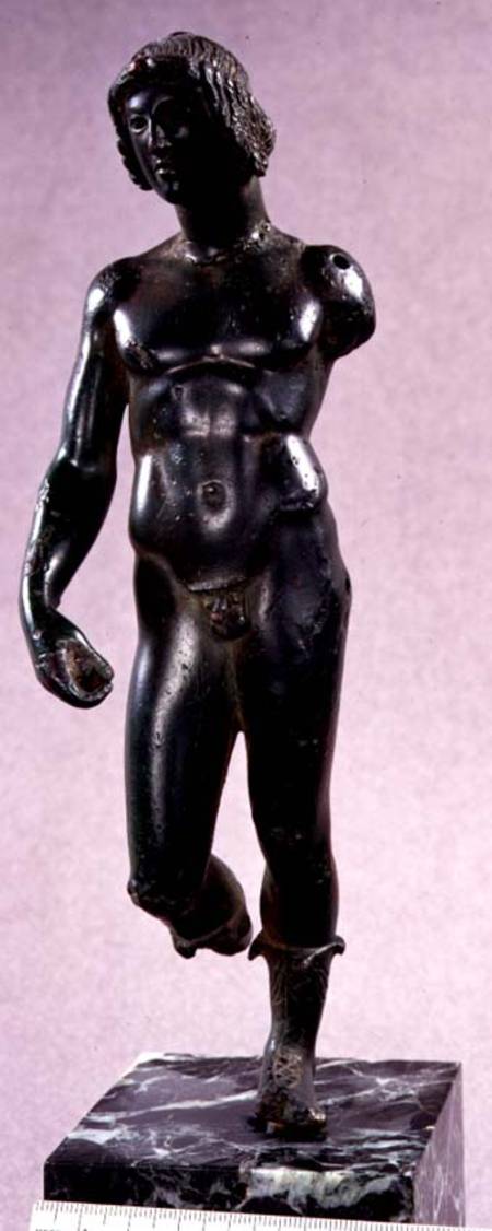 Statuette of a nude male wearing boots, possibly Dionysus, from Argive,Greek a Anonimo