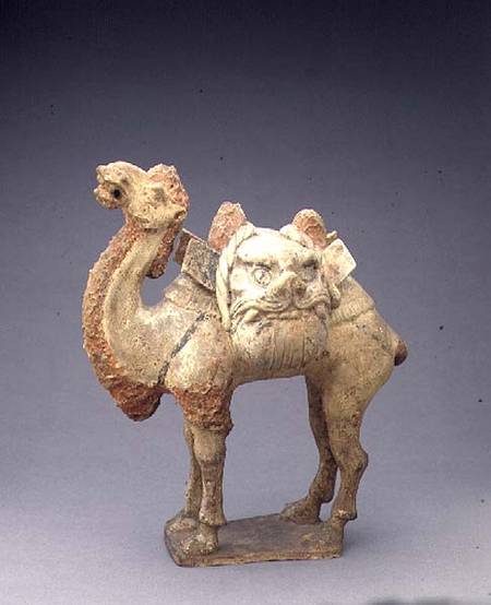 Tomb figure of a camel, carrying saddle bags in the form of grotesque faces, Chinese,Tang Dynasty a Anonimo