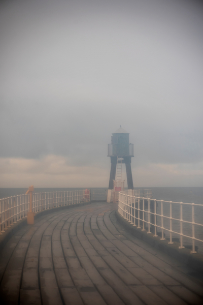 Whitby Harbour West Lighthouse in Mist a Ant Smith