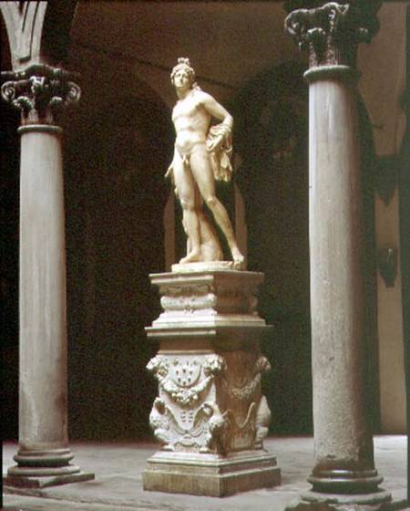 Bacchus on a base designed by Benedetto da Rovezzano (1474-1552) within the inner courtyard designed a Baccio Bandinelli