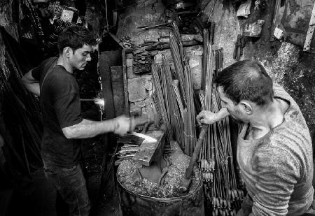 The traditional blacksmithing profession in the city of Mosul