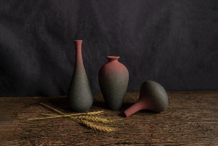 Ear of wheat and vase