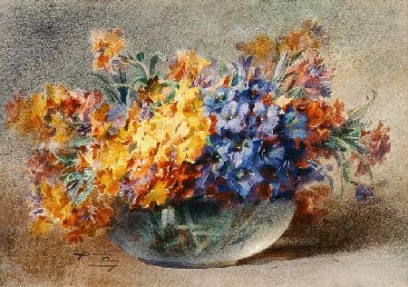 Spring flowers in a glass bowl