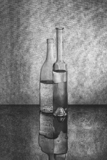 Black and white still life with glass utensils