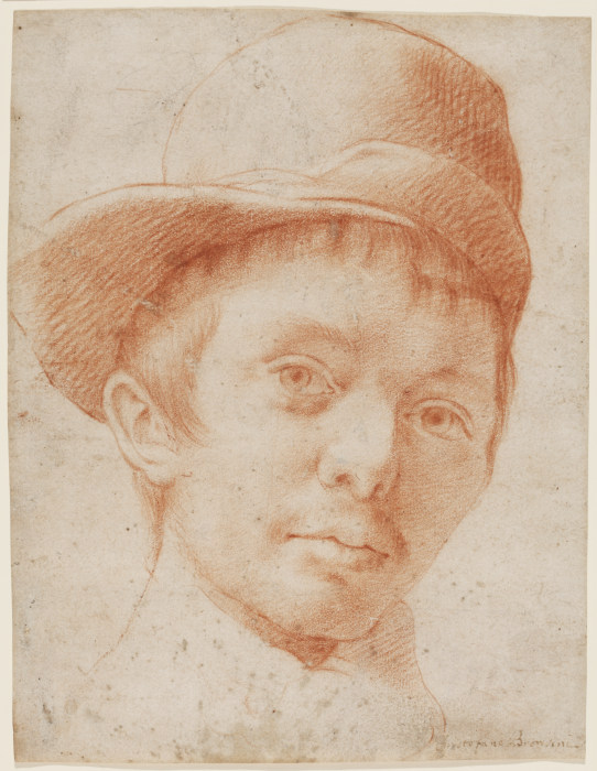 A boy wearing a workmans hat a Cristofano Allori