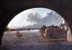 The Thames at Westminster seen through the arch of a bridge