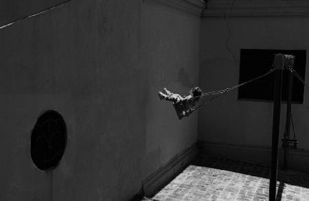 Swing against the wall (from the series &quot;Childhoods&quot;)