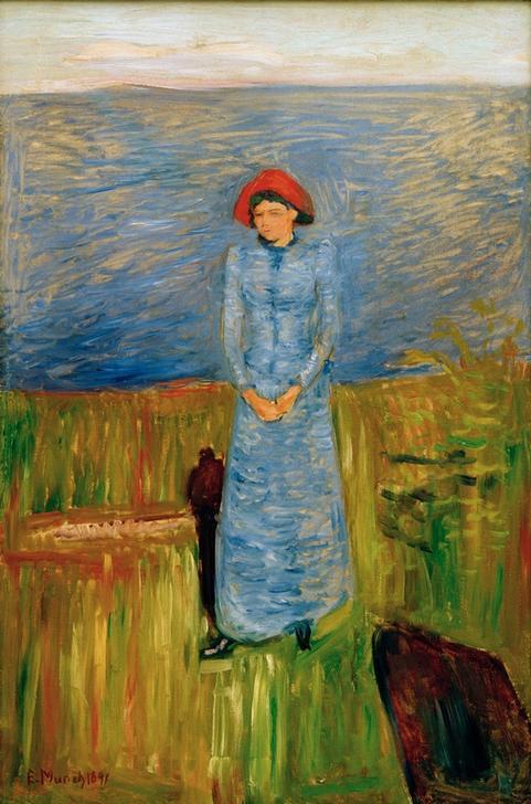 Woman with red hat at fjord a Edvard Munch