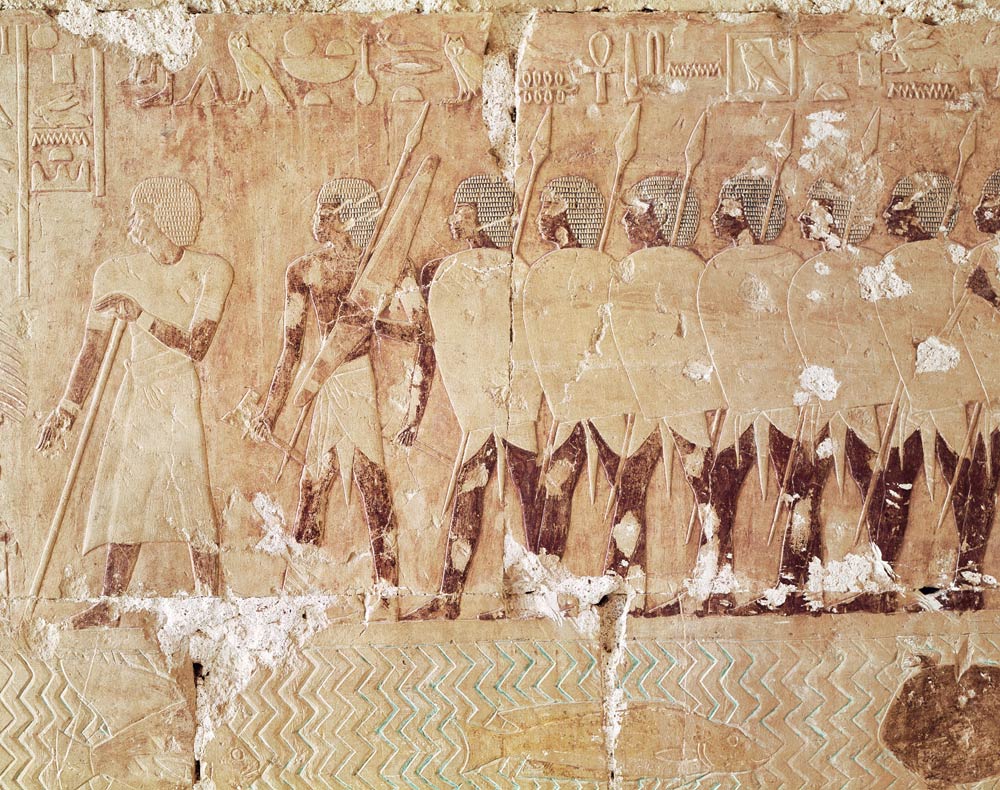 Relief depicting soldiers sent by Queen Hatshepsut on an expedition to the Land of Punt to bring bac a Egizi