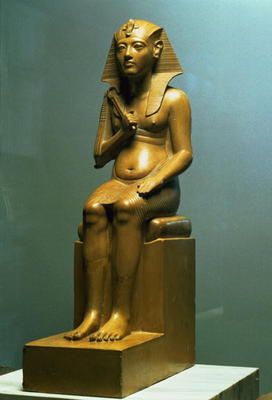 Seated statue of a pharaoh, New Kingdom (stone) a Egyptian 18th Dynasty