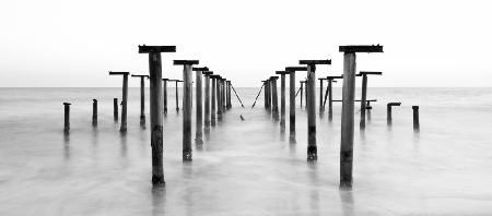 old pier and dramatic seascape