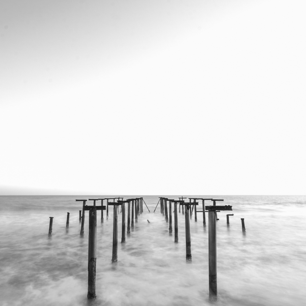 old pier and dramatic seascape a engin akyurt