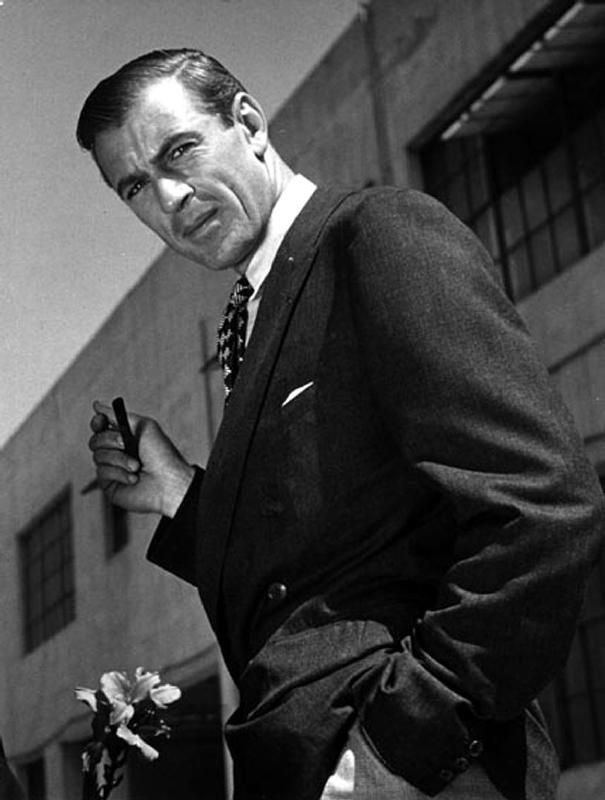 American Actor Gary Cooper smoking a pipe a English Photographer, (20th century)