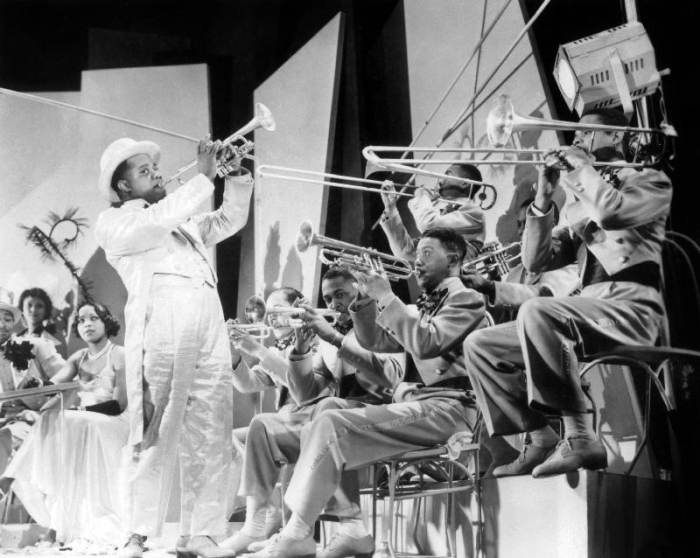Dr. Rhythm de FrankTuttle avec Louis Armstrong a English Photographer, (20th century)