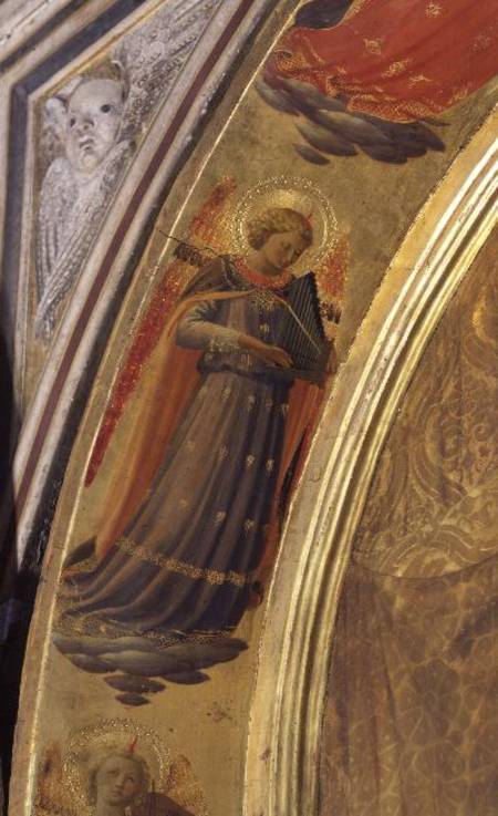 Detail from the side of the Linaivoli Triptych showing an angel holding a portative organ a Fra Beato Angelico