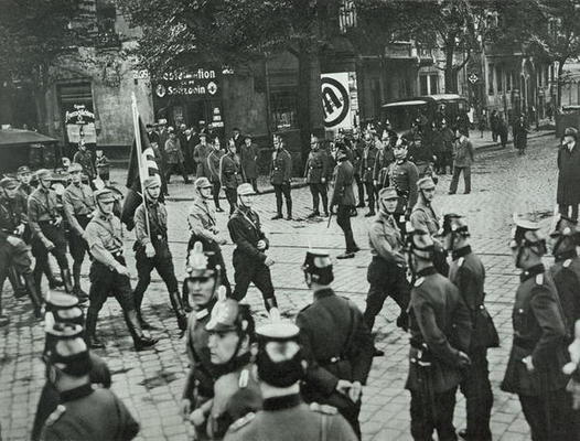 Regular Army and Prussian Police observing an SA demonstration in Neukoelln, Berlin, 26th September a German Photographer, (20th century)