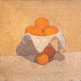 fruit stand with oranges over a white napkin