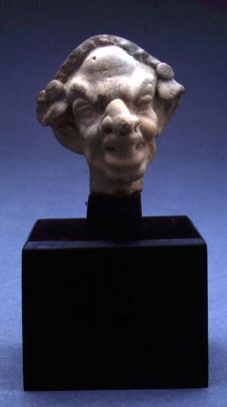Grotesque head of a woman a Greci Greci
