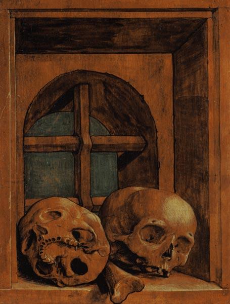Two skulls in a window recess