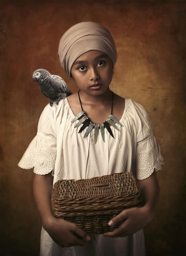 She and her little parrot a Hari Sulistiawan
