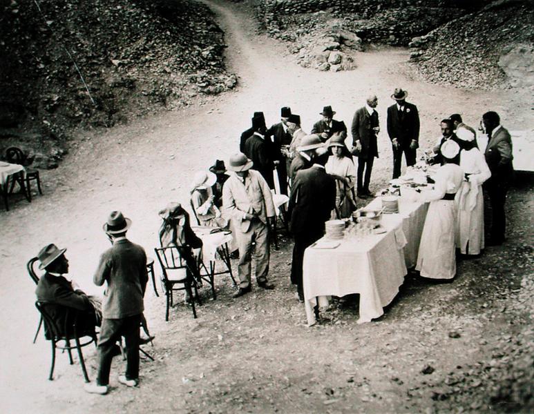 Distinguished visitors taking refreshments near the Tomb of Tutankhamun at the opening of the inner  a Harry Burton