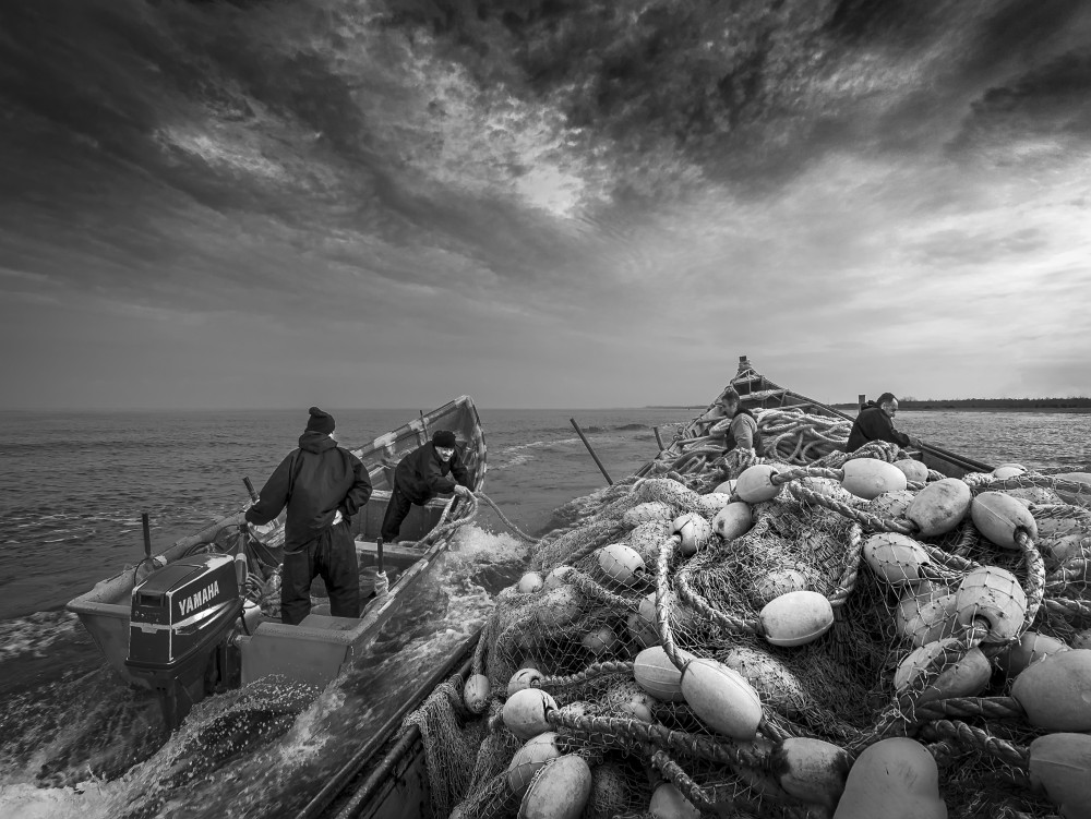 Fishermen go to the storm. a Hosein.Riahi