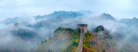 Mother and daughter climbing the steps on the Great Wall