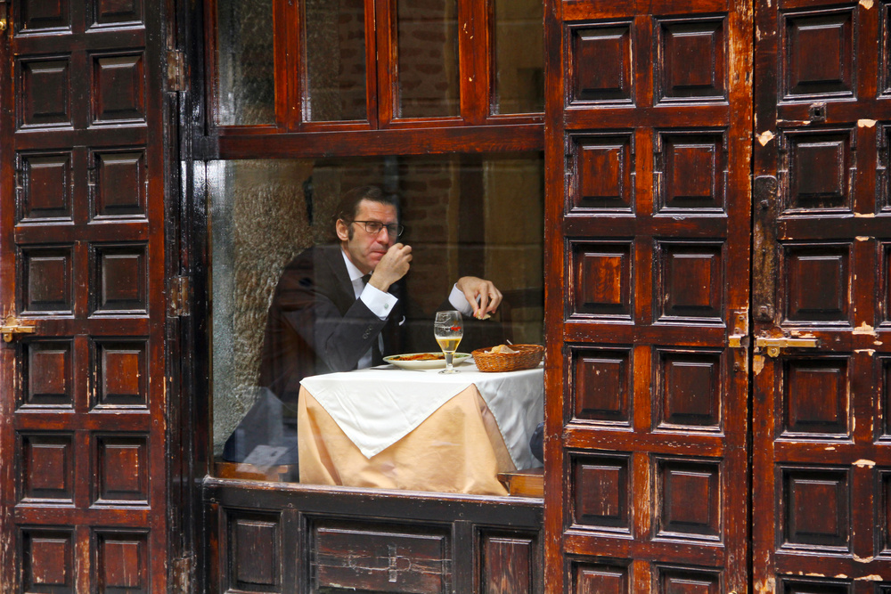 Lonely Man Dinner in Madrids Latin Quarter a Igor Shrayer