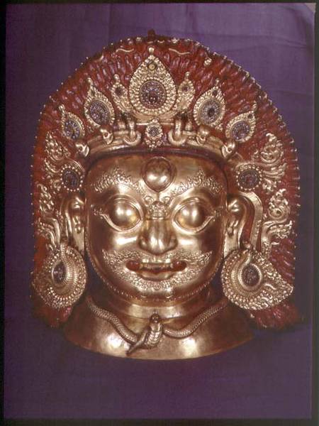 Head of Bhairava, embossed copper, painted and gilded, probably Nepalese a Scuola indiana