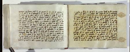 Two pages of a Koran manuscript written in Oriental Kufic script a Scuola Islamica