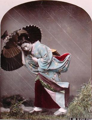 Young Japanese Girl in the Rain, c.1900 (hand coloured photo) a Japanese Photographer (20th century)