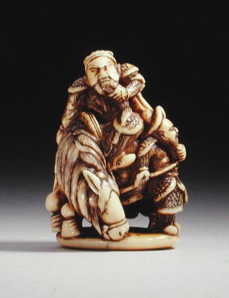 Netsuke in the form of a Chinese warrior on horseback with his attendant a Japanese School