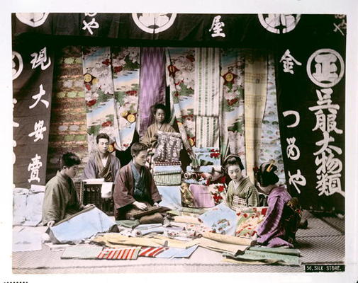 Japanese Silk and Fabric Shop, c.1900 (hand coloured photo) a Japanese School, (20th century)