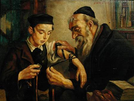 A Rabbi tying the Phylacteries to the arm of a boy a Jewish School