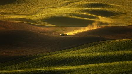 A tractor in the Palouse wheat fields
