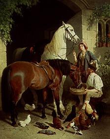 When feeding the horses a John Frederick Herring Il Vecchio