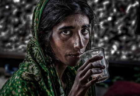 Bangladeshi woman having chai