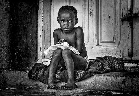 Doing her school homework - Accra (Ghana)