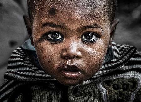 Indian child at a Kumbh Mela Festival - Prayagraj - India