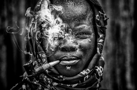Laarim woman smoking-South Sudan