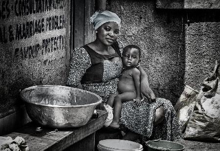 Mother and her child in the streets of Ghana.